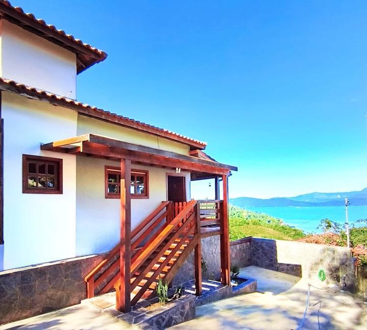 The house above the bay, stairs down to the pool deck