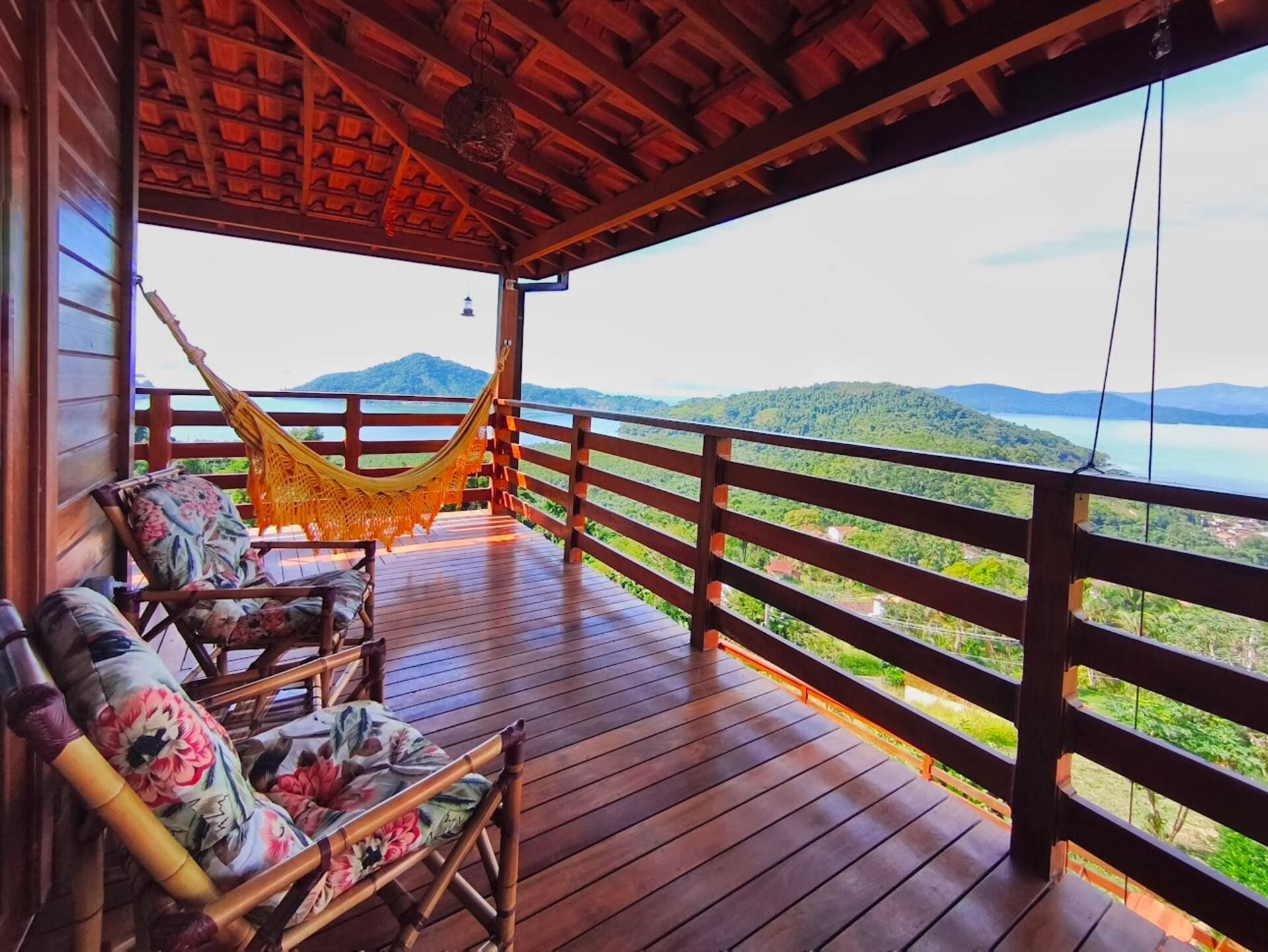 Hammocks on the veranda, the bay beyond