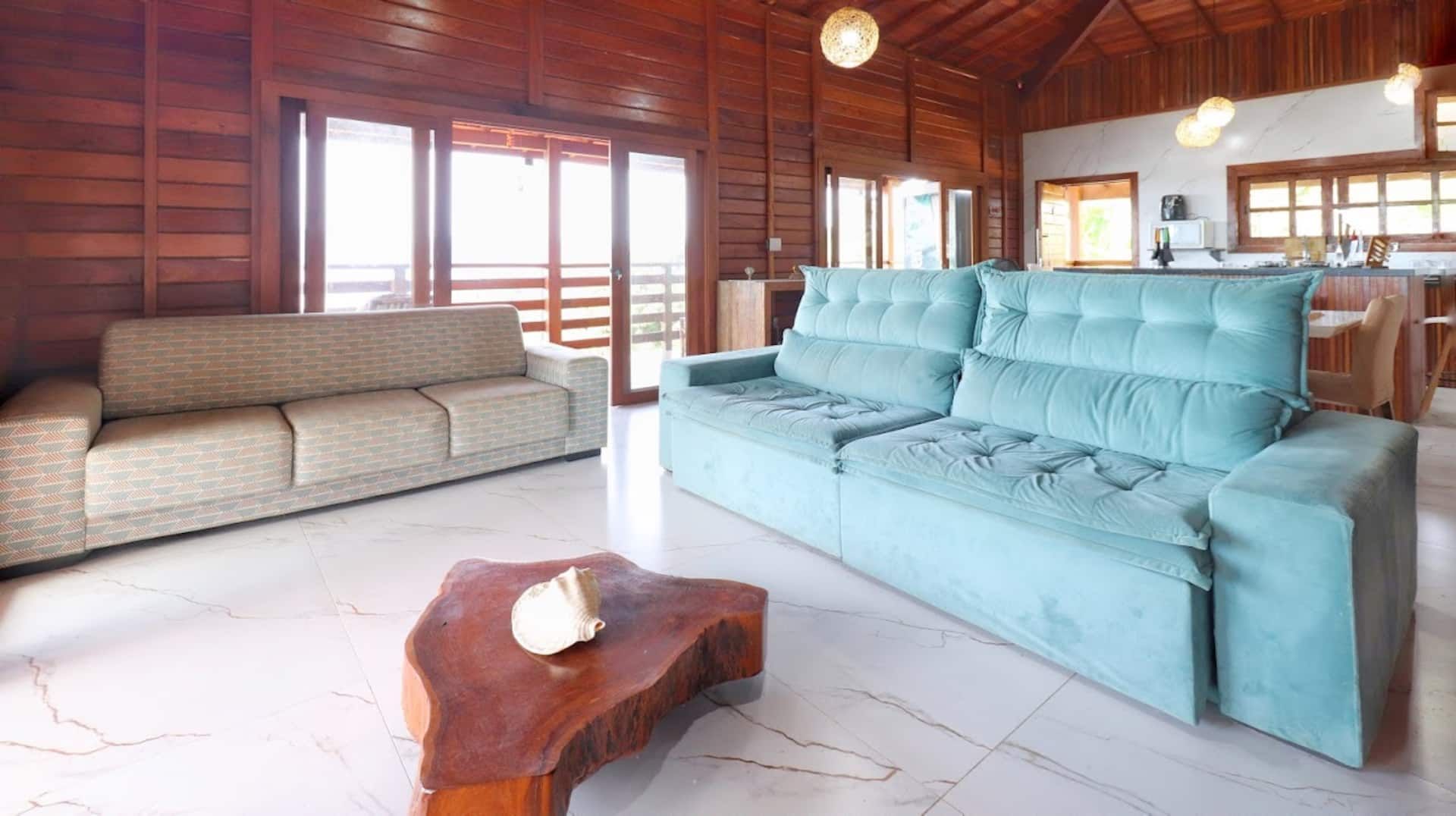 The living room and its blue sofas