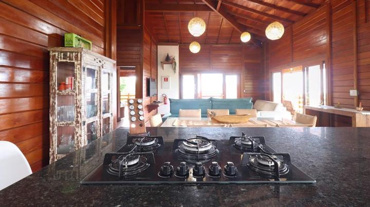 The kitchen island and five-burner cooktop