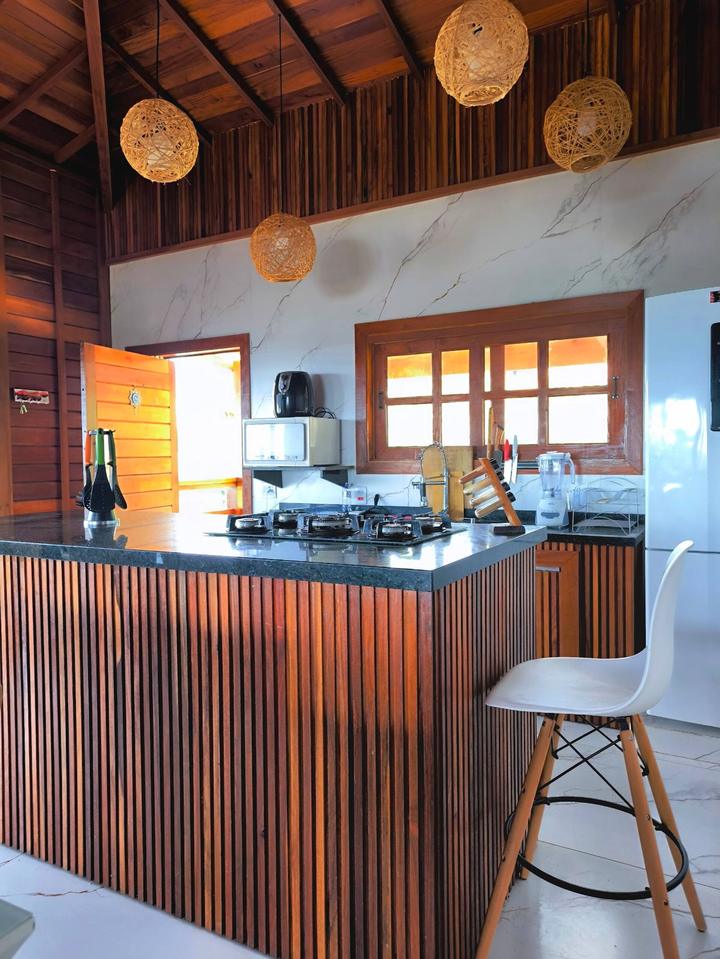 The kitchen, open to the dining room