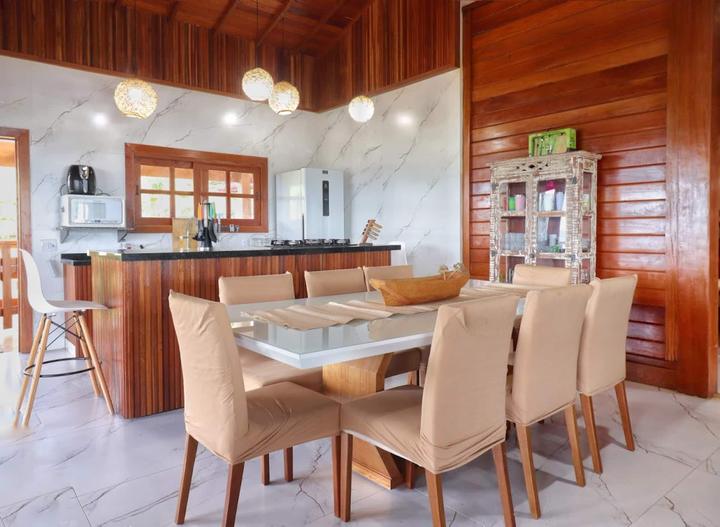 The glass dining table for eight