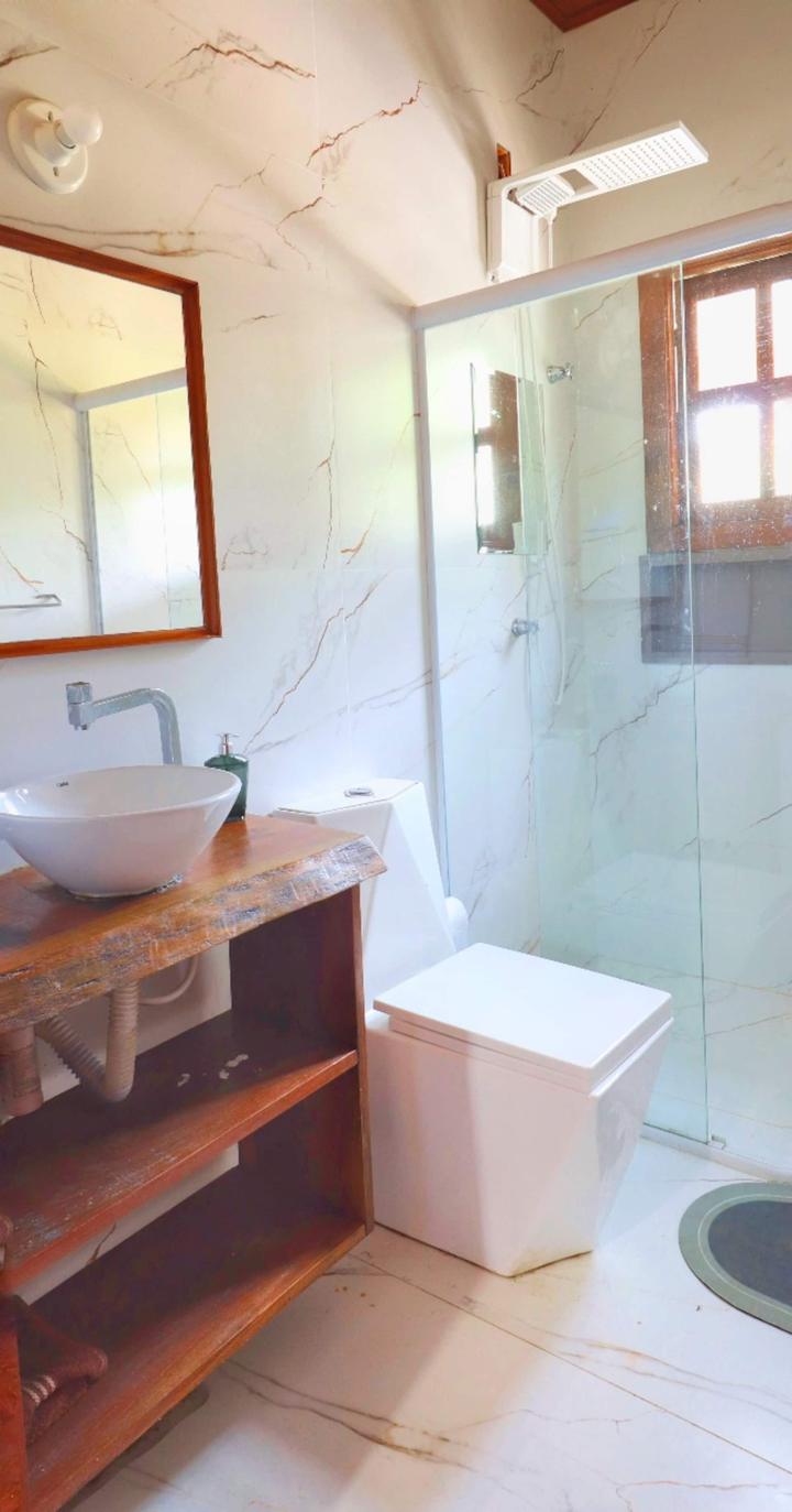 One of five full bathrooms